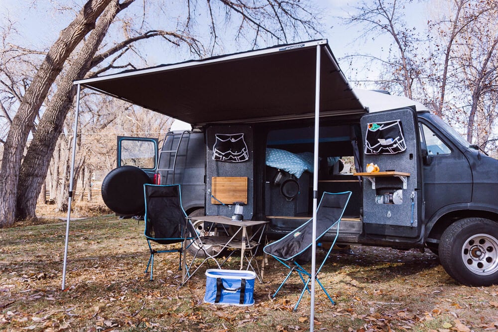 camper van conversion with a camping awning attachment