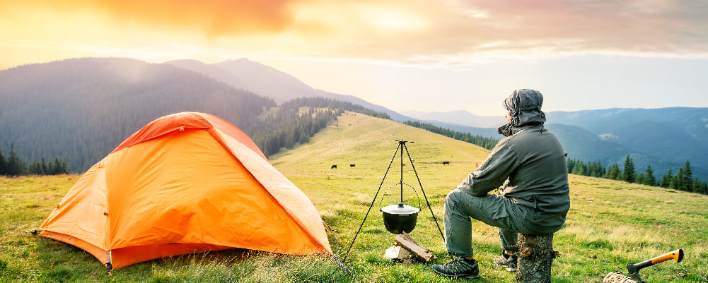 Man in the Mountains camped