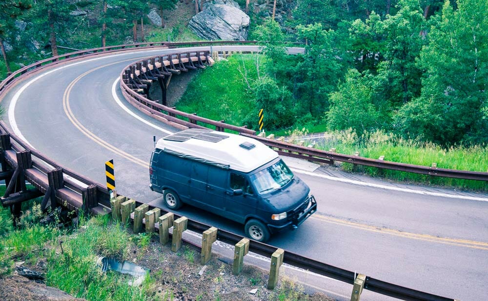 driving through the Black Hills on Iron Mountain Road in our van