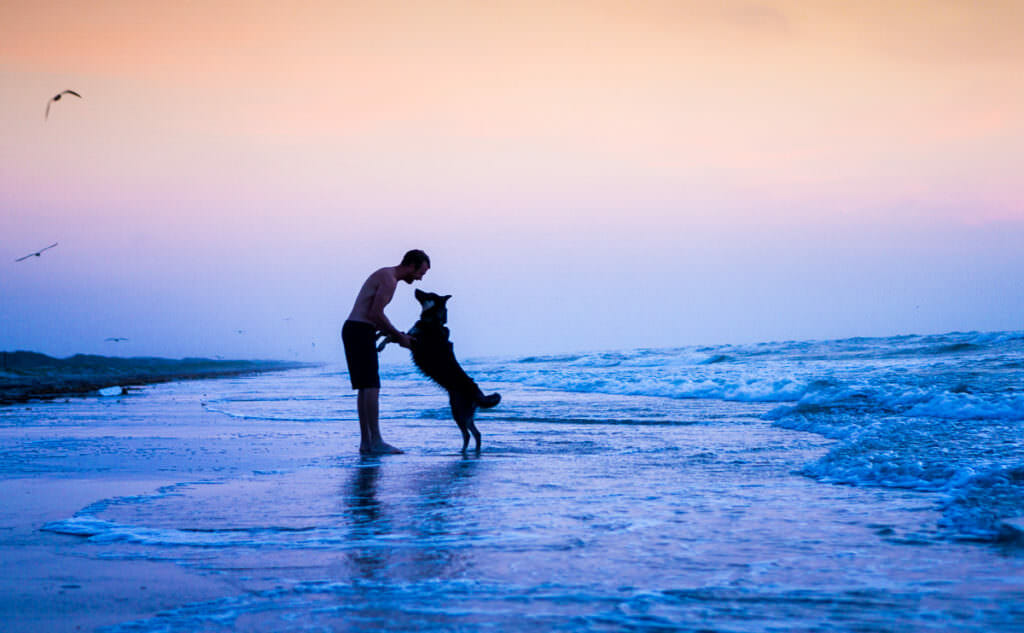 dancing with our dog on the beach in corpus cristi texas