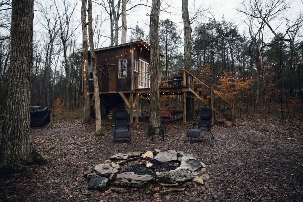 camping in an adult glamping treehouse cabin in the woods of tennesse