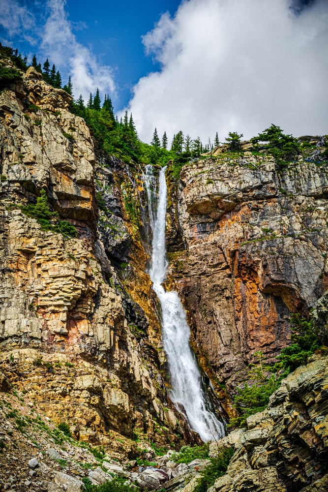 apikuni waterfall in glacier national park montana