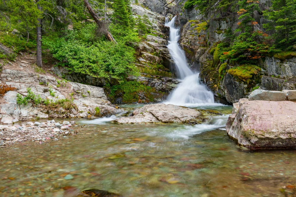 hiking to aster falls in glacier national park montana