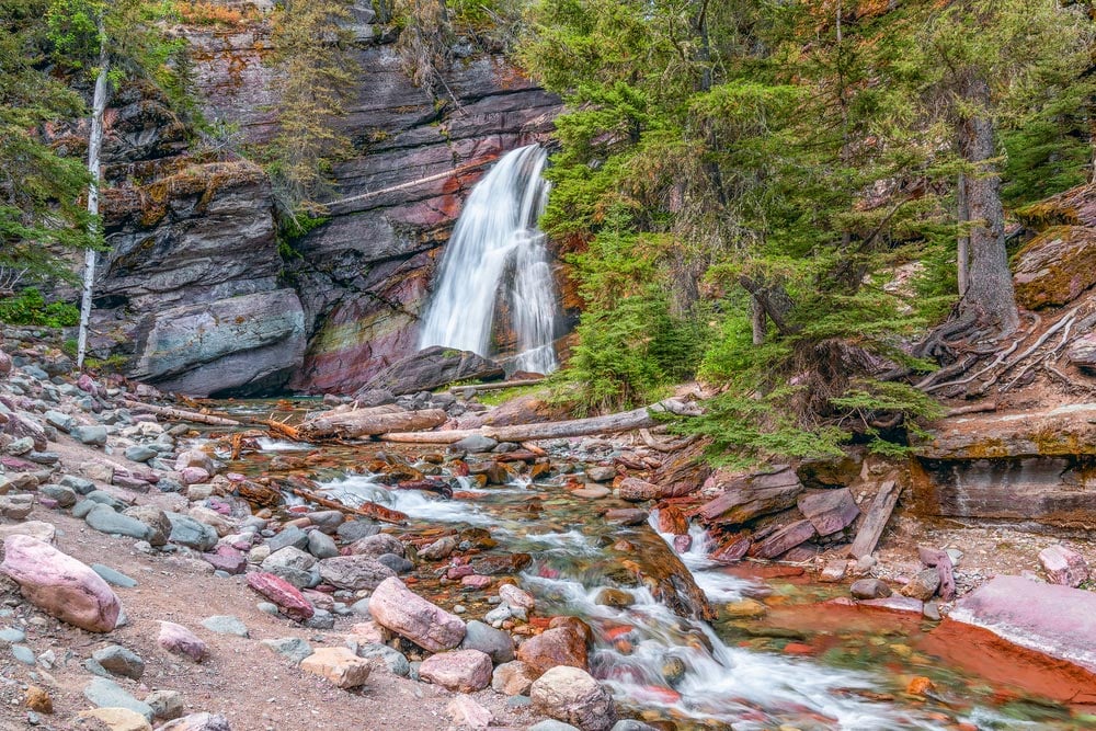 hiking to baring falls in glacier national park