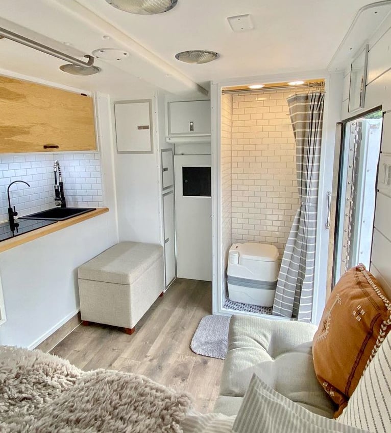 beautiful camper van conversion with a bathroom inside