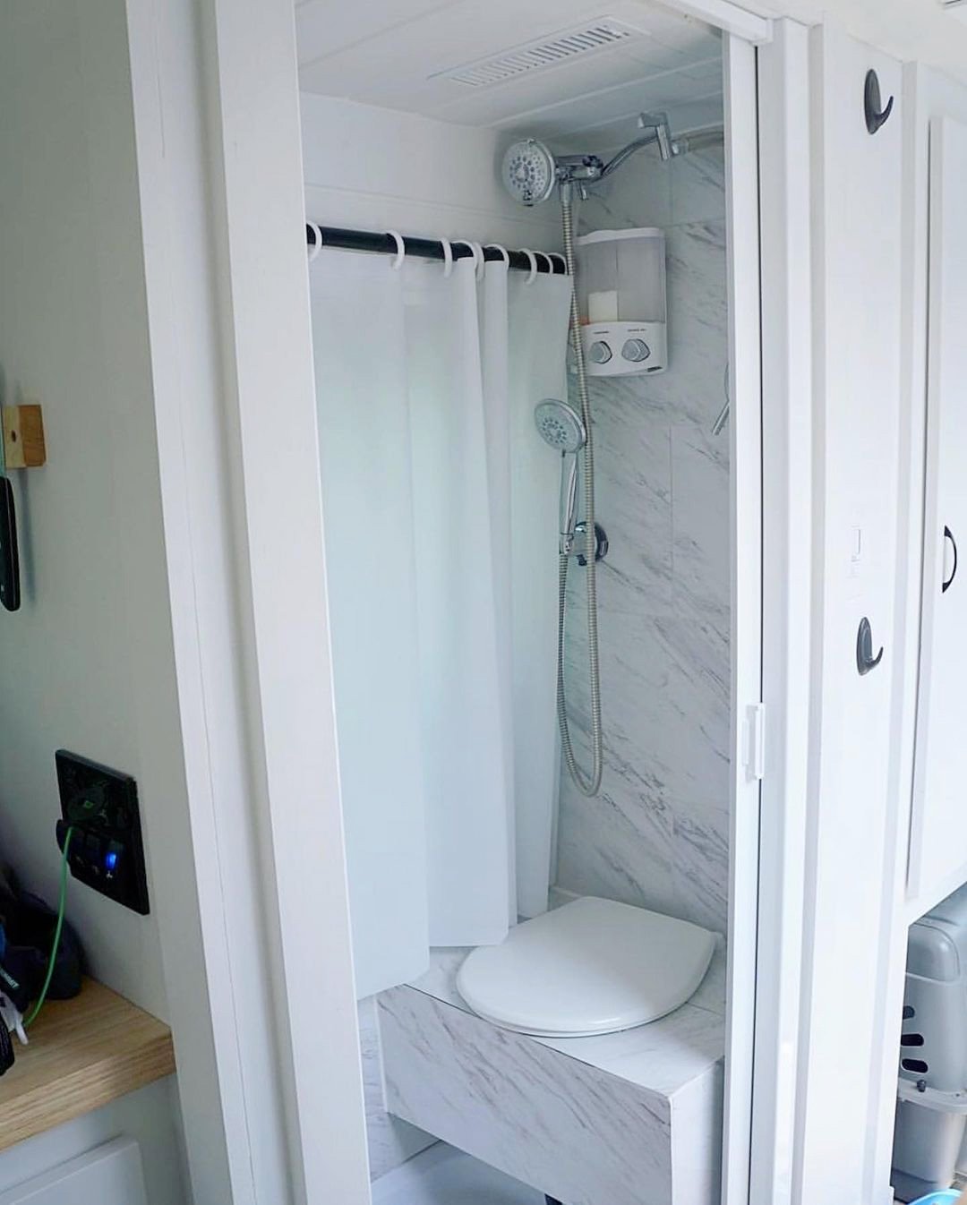 camper van with a toilet and shower wet room inside