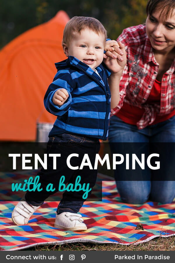 play with baby on a family tent camping trip