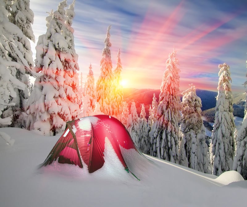 camping in the snow during winter