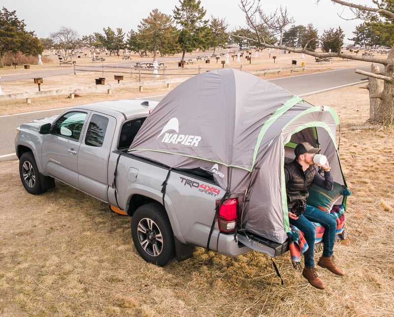 Camping in the back of a small truck bed tent