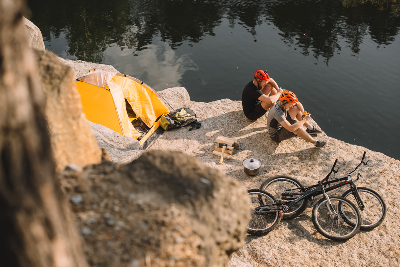 Camping with mountain bikes brought to the trail in a truck bed