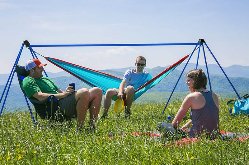camping with a portable hammock stand