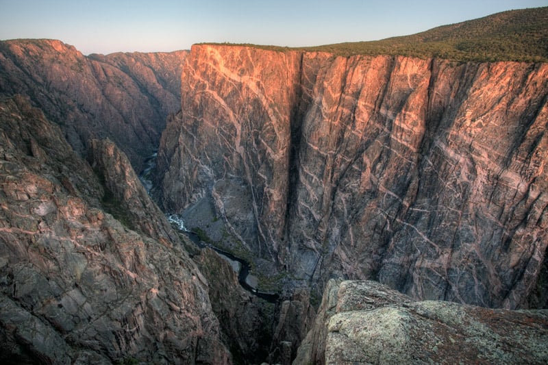 sunrise on the painted wall in black canyon of the gunnison