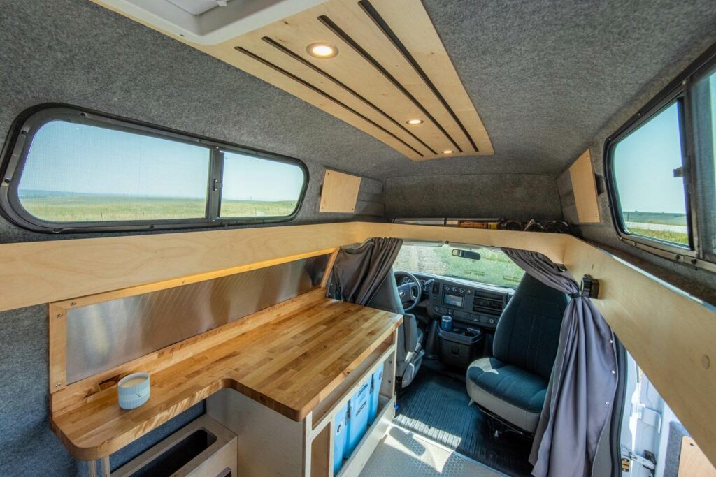 van life in a chevy express van conversion built and designed by Contravans