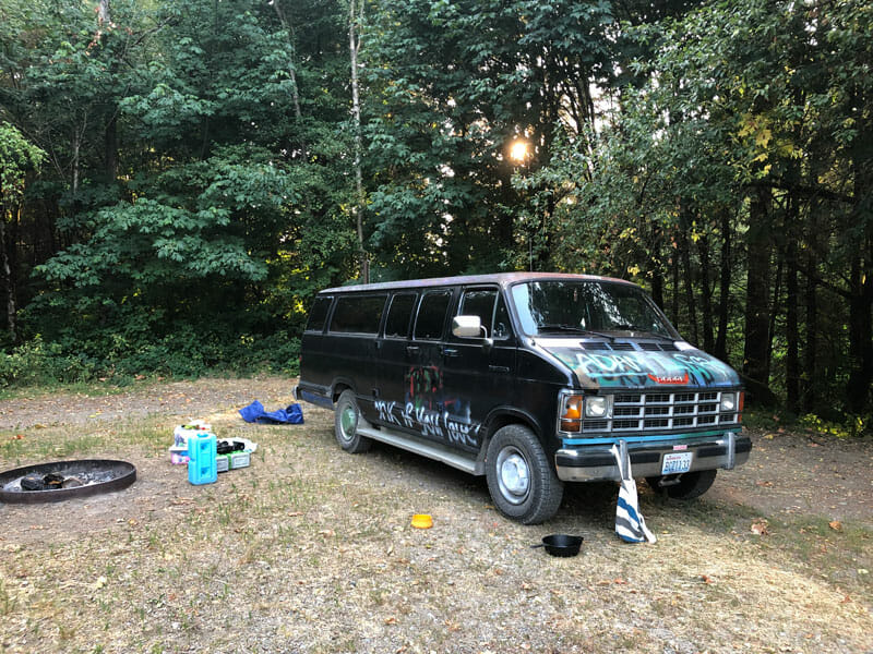 creeper van at a campsite