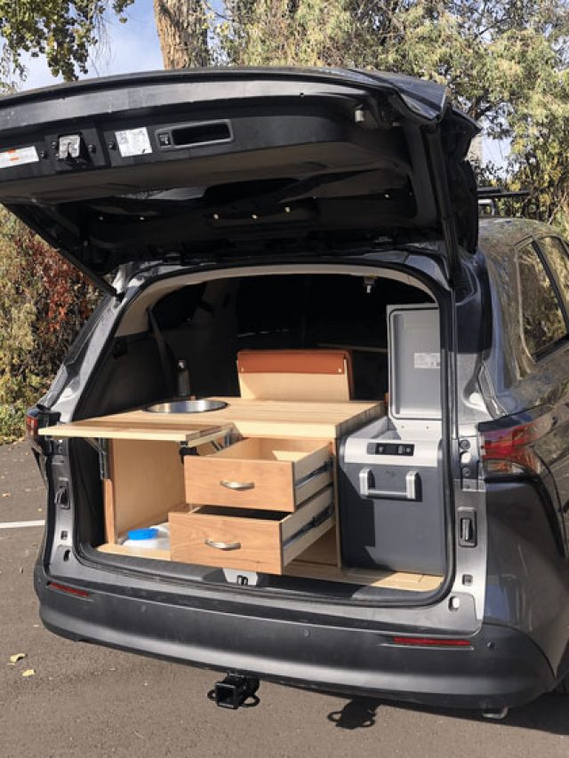 toyota sienna xle camper van conversion with drawers and refrigerator in the back