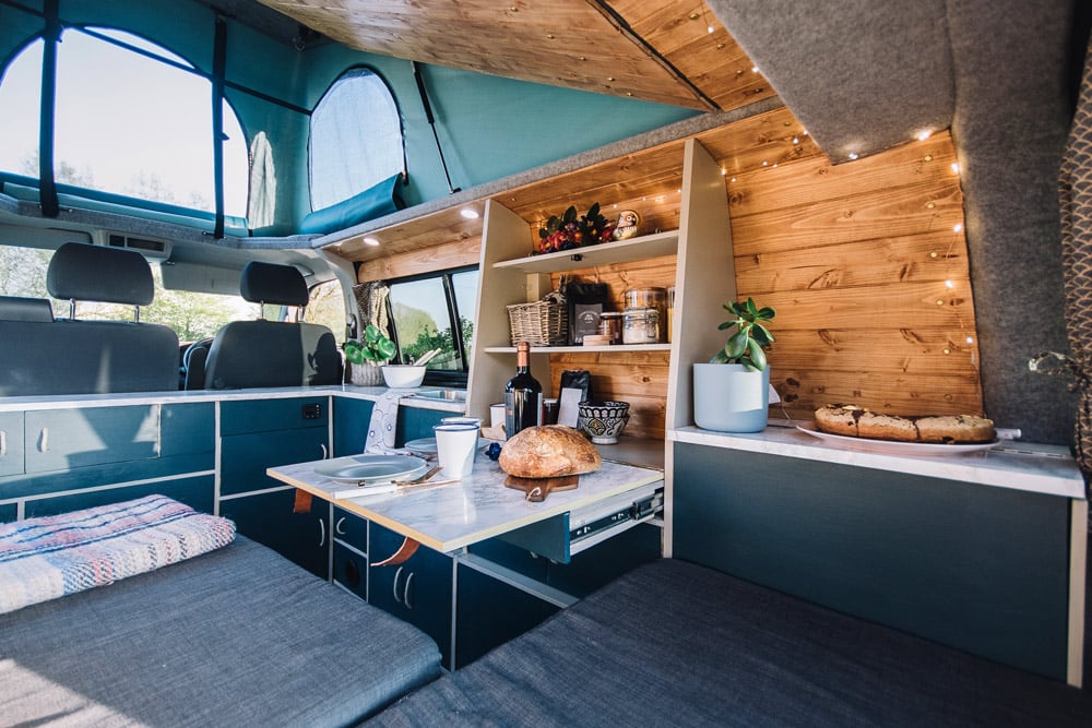 the inside of a camper van conversion designed for full time van living