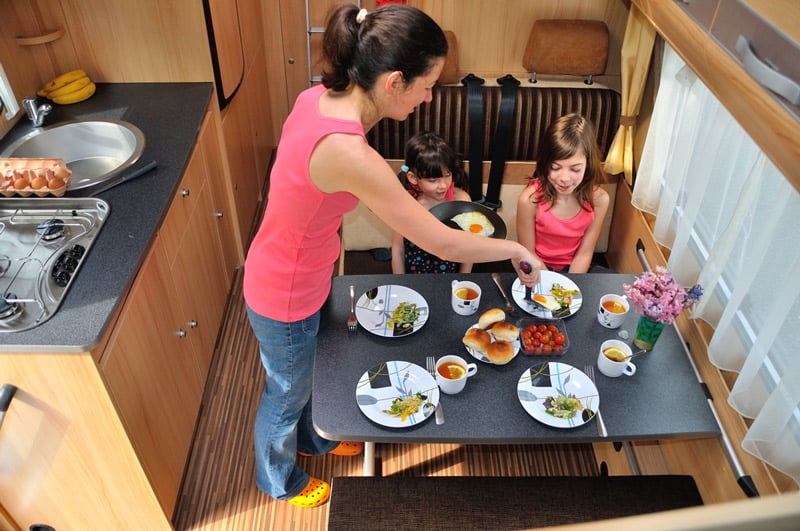 serving dinner on clean plates in an rv