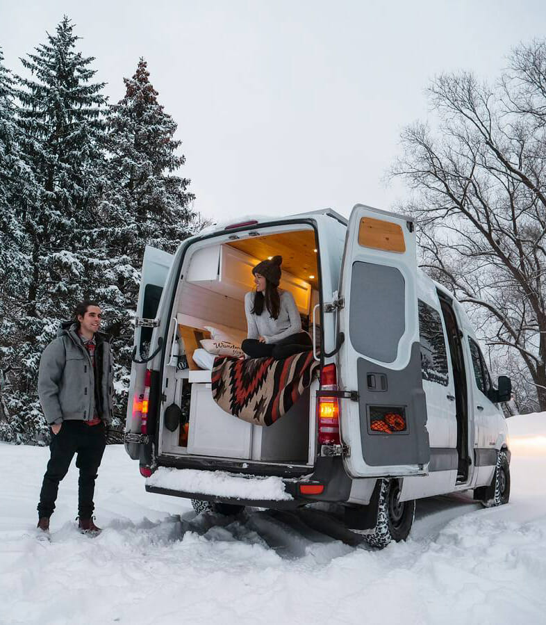 sleeping in a campervan conversion in the winter