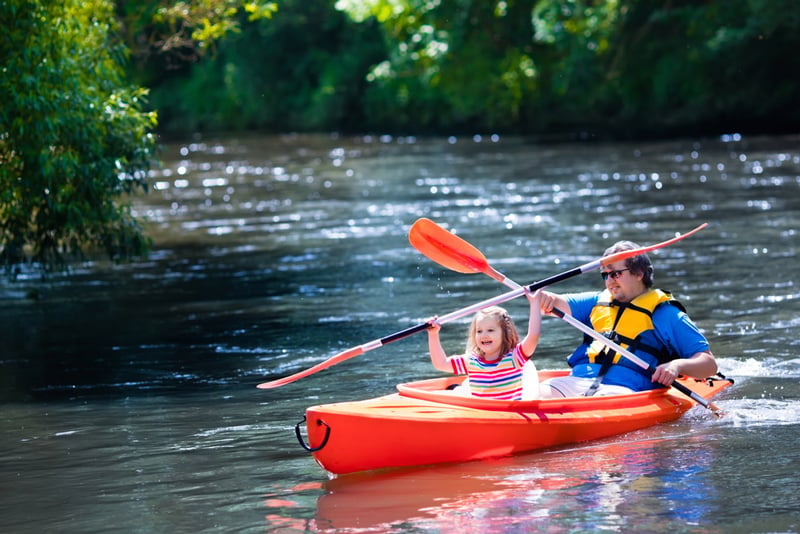 kayaking in tandem with kids