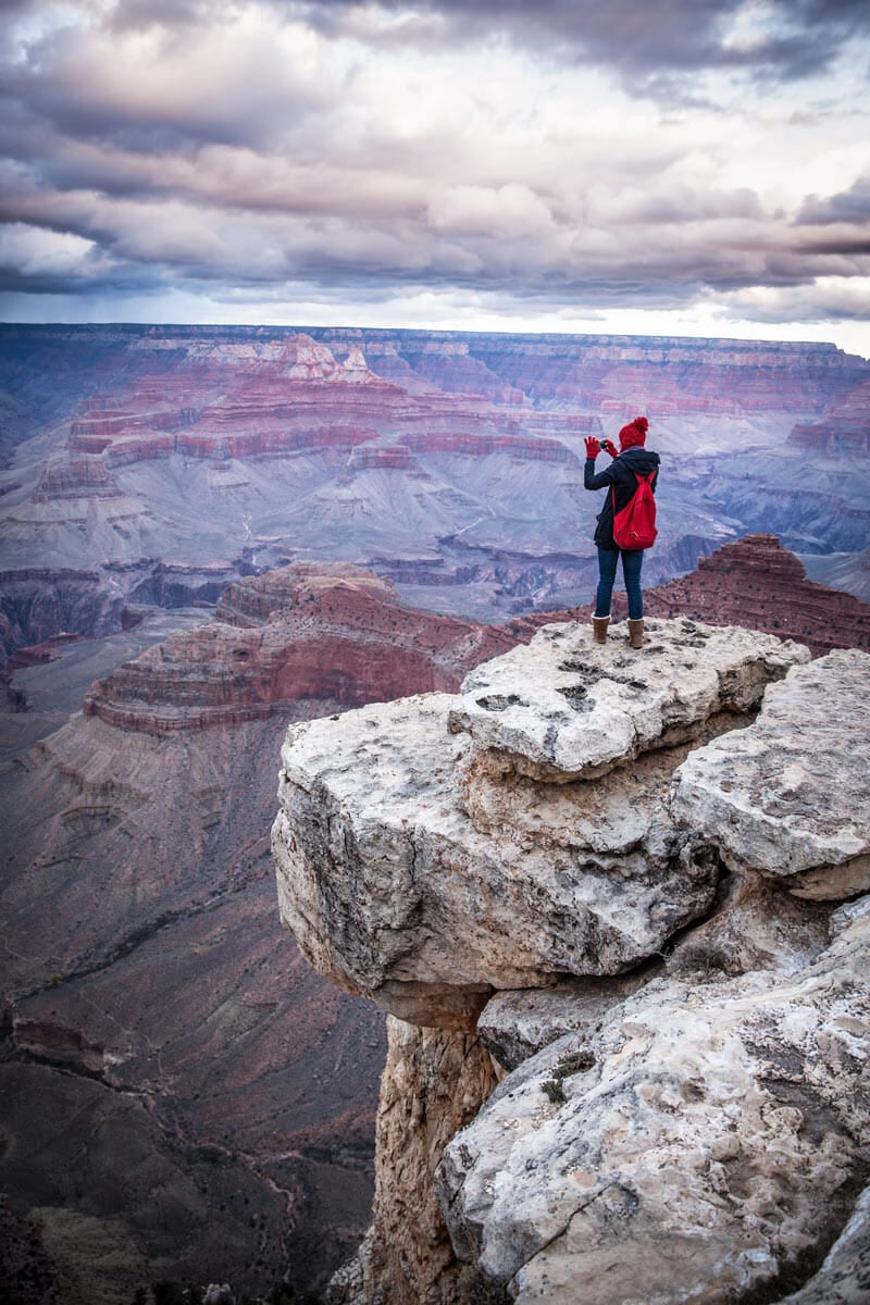 doing photography on an overlook on the grand canyon north rim