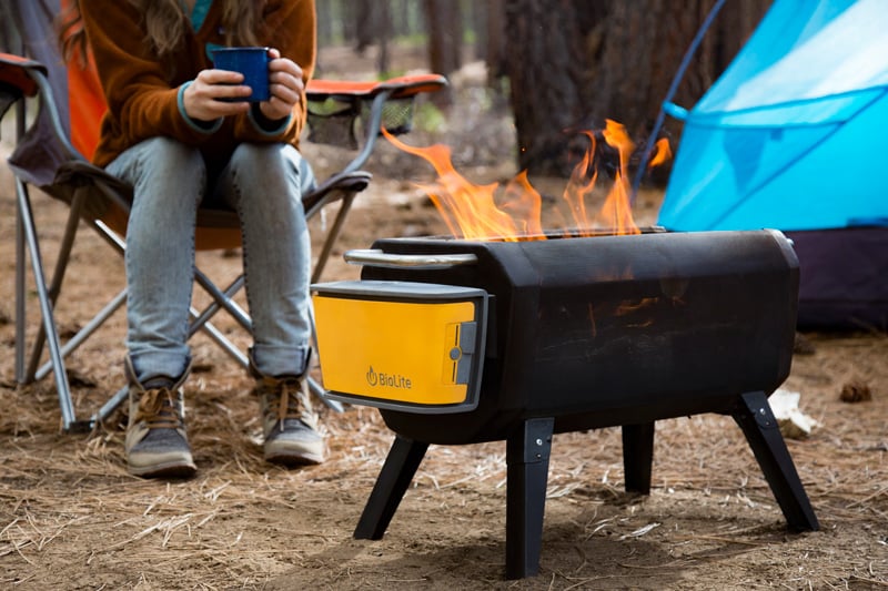 grilling on a portable biolite campfire pit