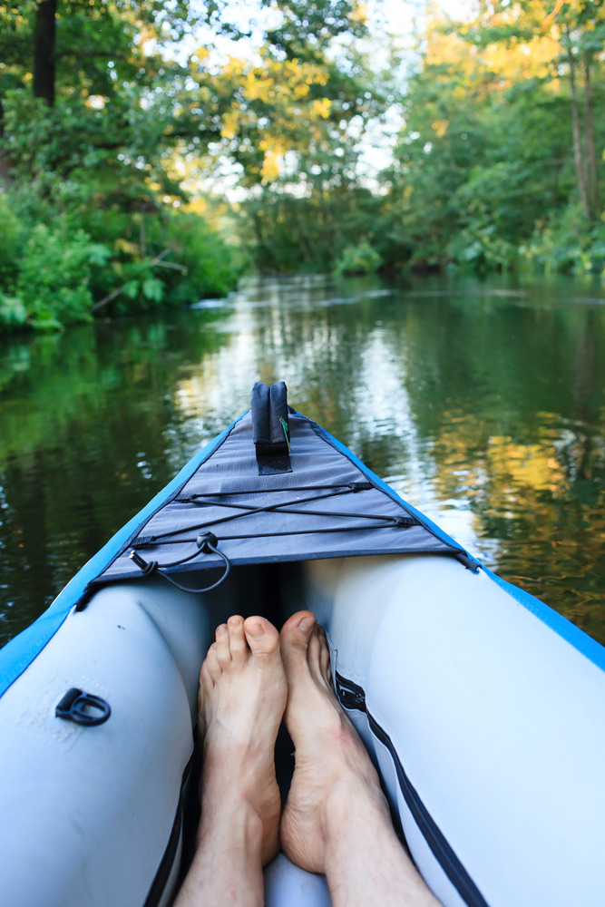 sitting in an inflatable fishing kayak