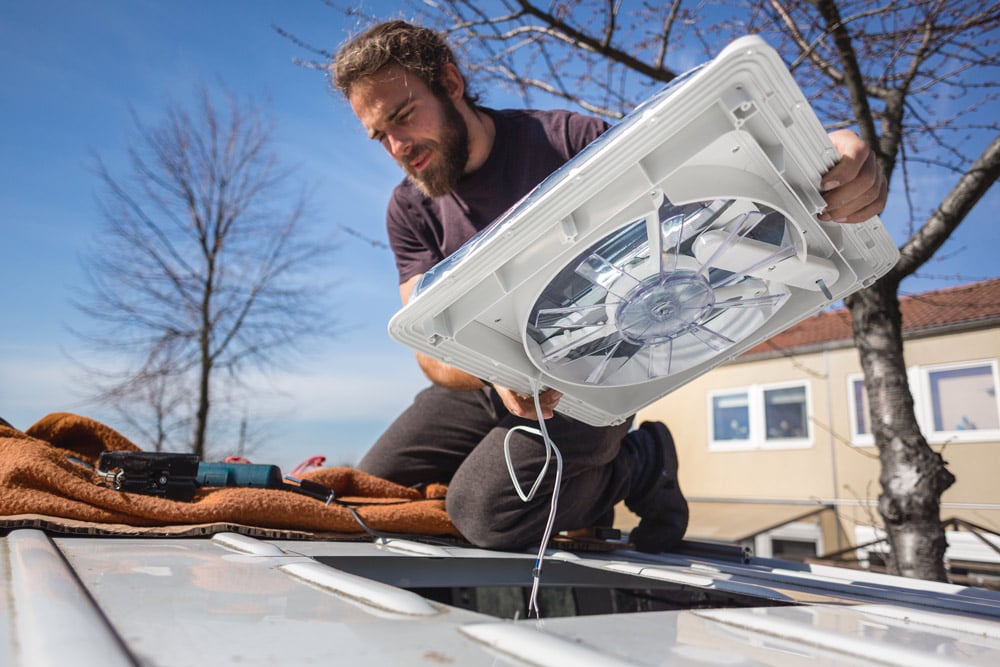 installing a vent fan on top of a van conversion