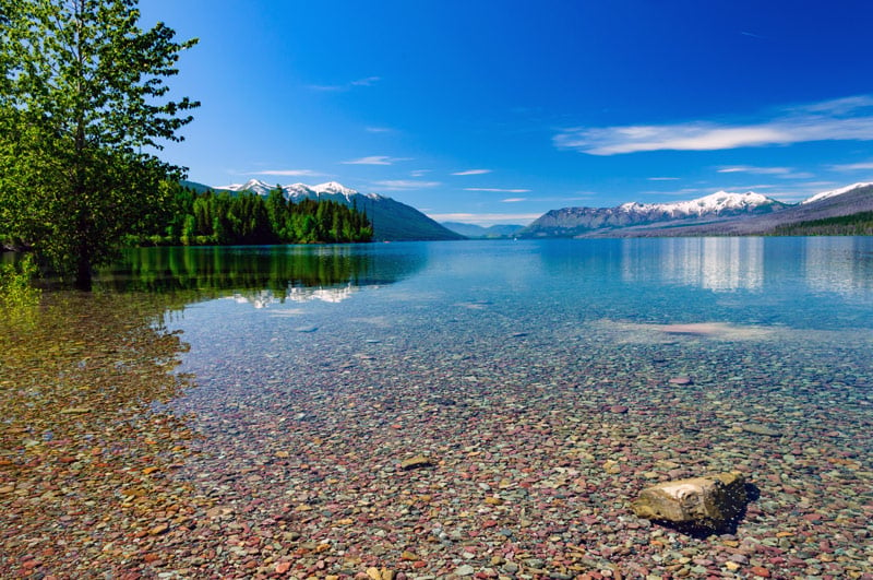 colorful rocks at lake mcdonald in glacier national park