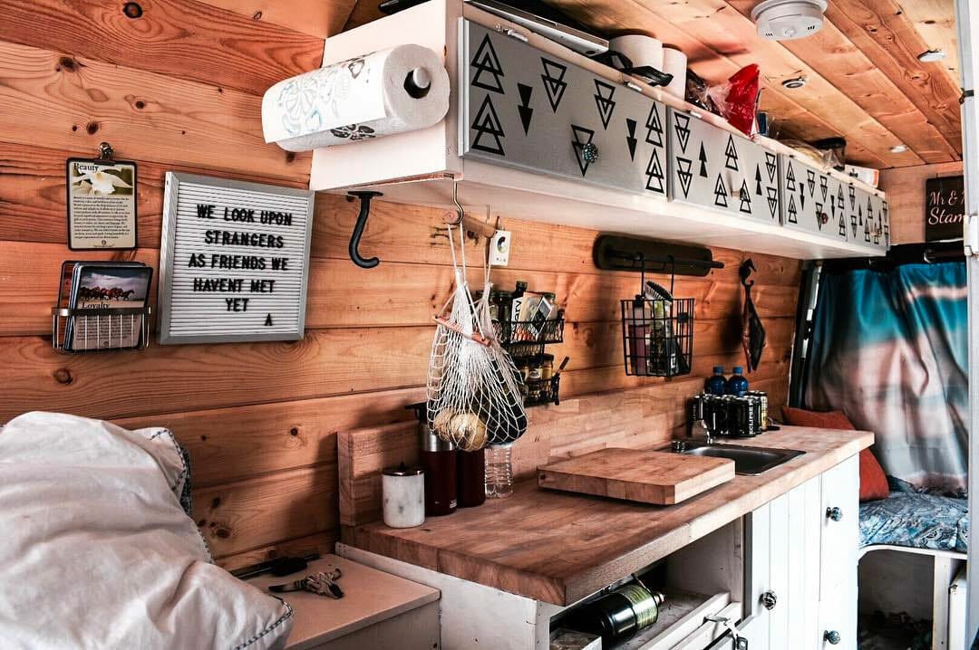 Van build kitchen storage in a diy custom campervan interior