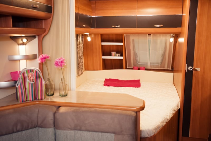 custom bed and furniture design inside an rv