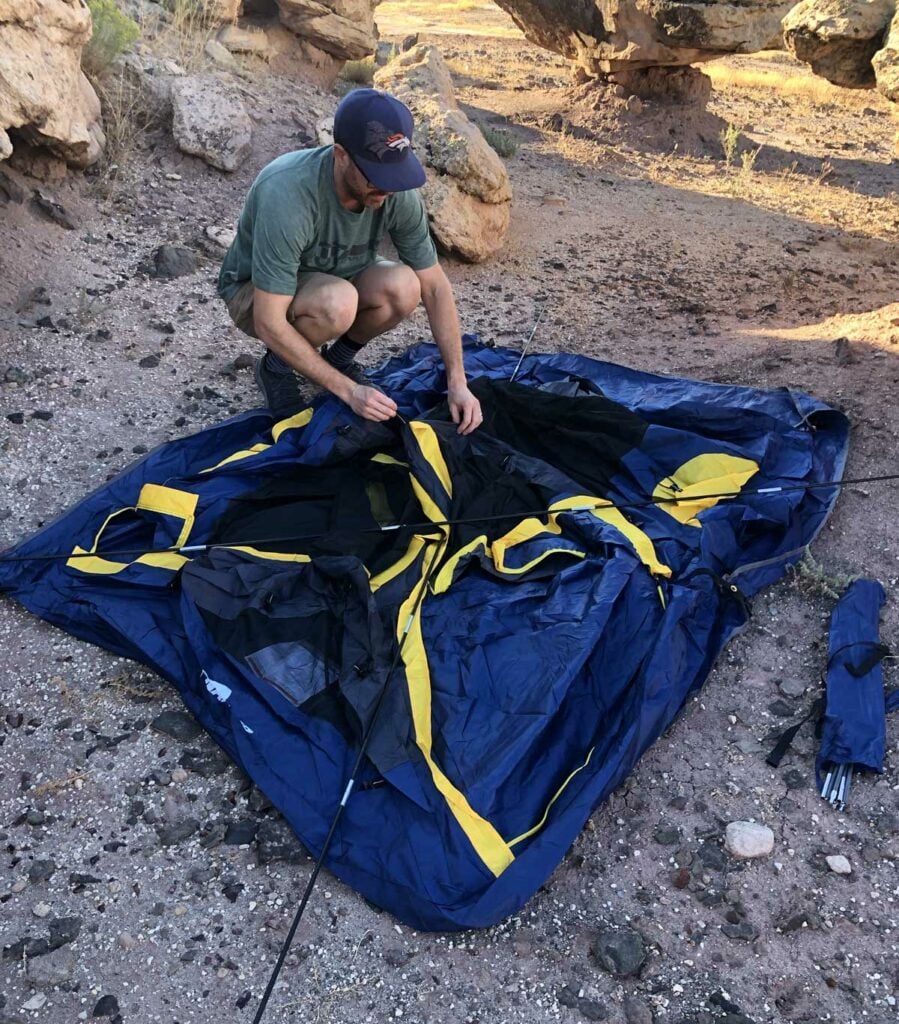 setting up a napier camping tent outdoors