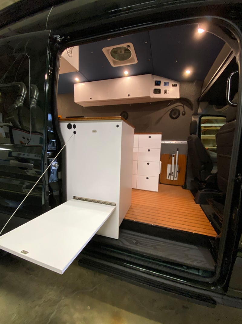 overland van project camper conversion storage