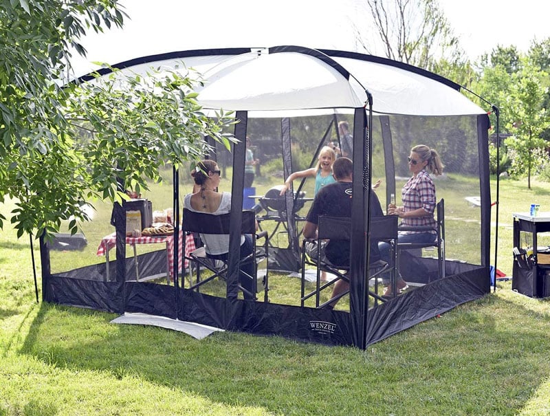 having a picnic in a screen tent