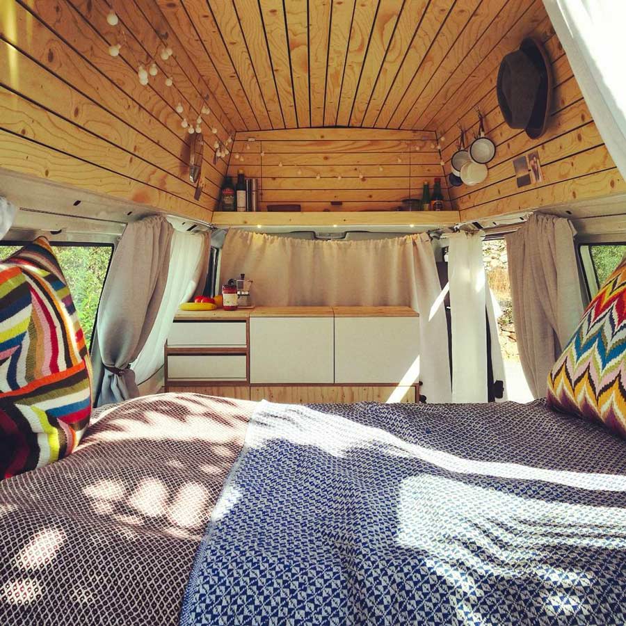 Light colored wood campervan conversion