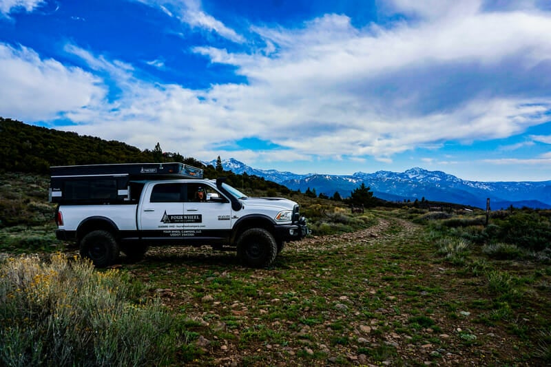 pop up truck camper on a camping trip