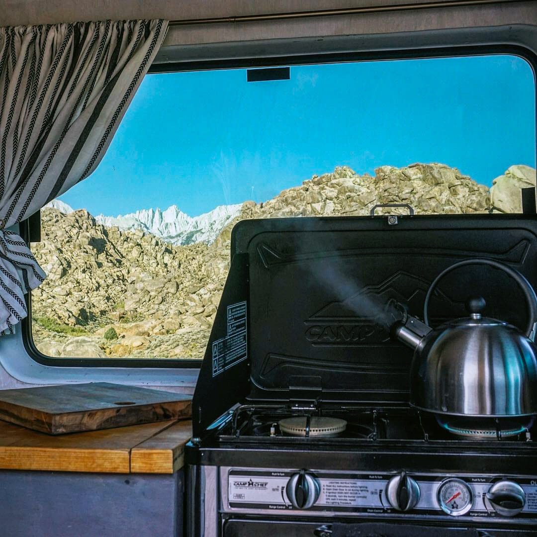 boiling water in a campervan on a portable oven