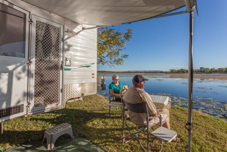 Couple relaxing in an RV rental on vacation
