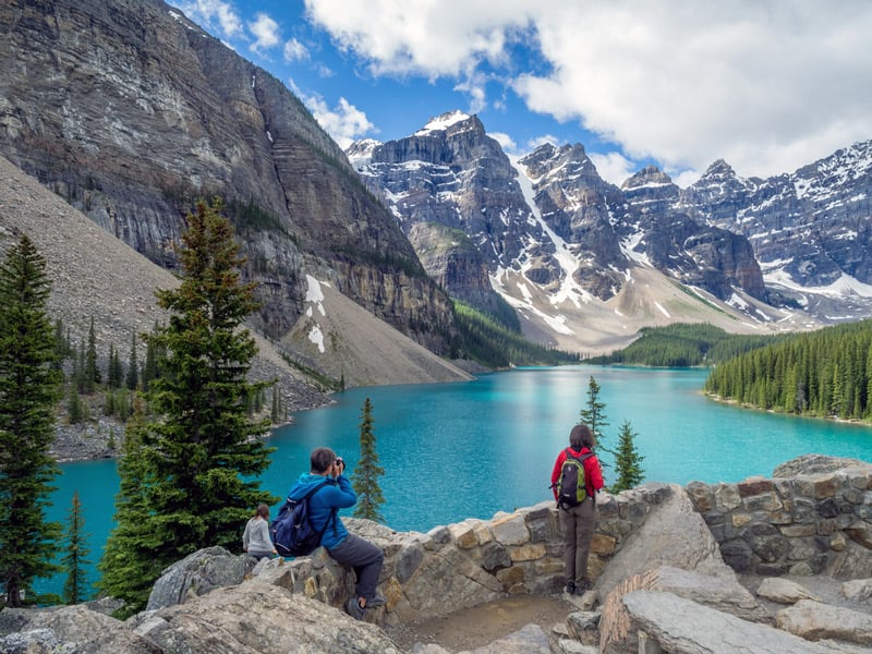 tourists visiting moraine lake in rocky mountain national park colorado