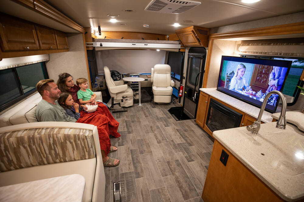 watching television in an RV or motorhome while on a family road trip