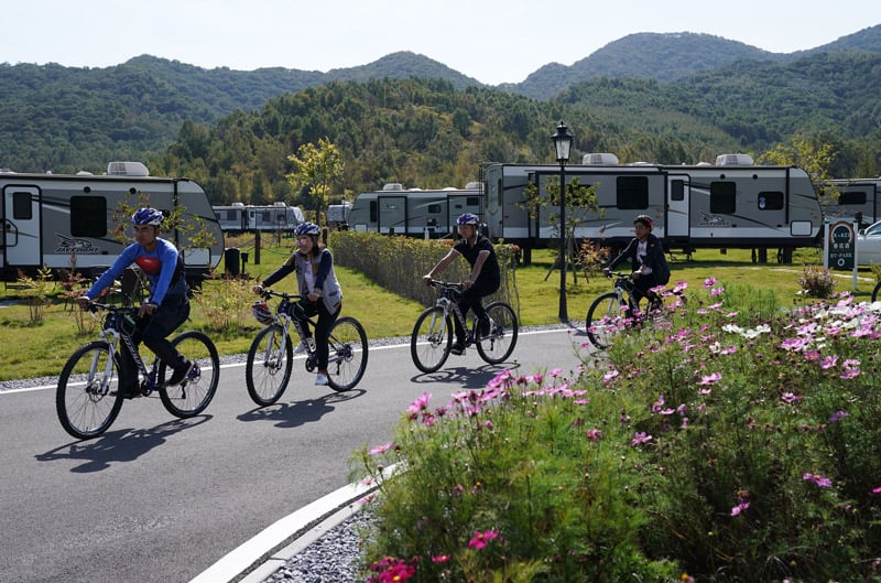 RV campground family bike ride