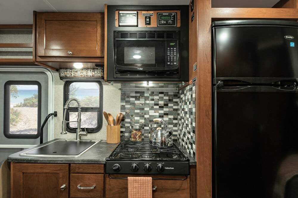 RV kitchen with a propane refrigerator