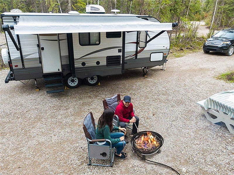 RV campers with a portable fire pit