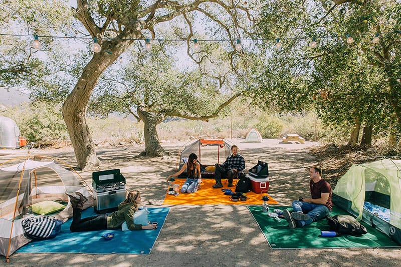 tent camping with a sand free outdoor rug