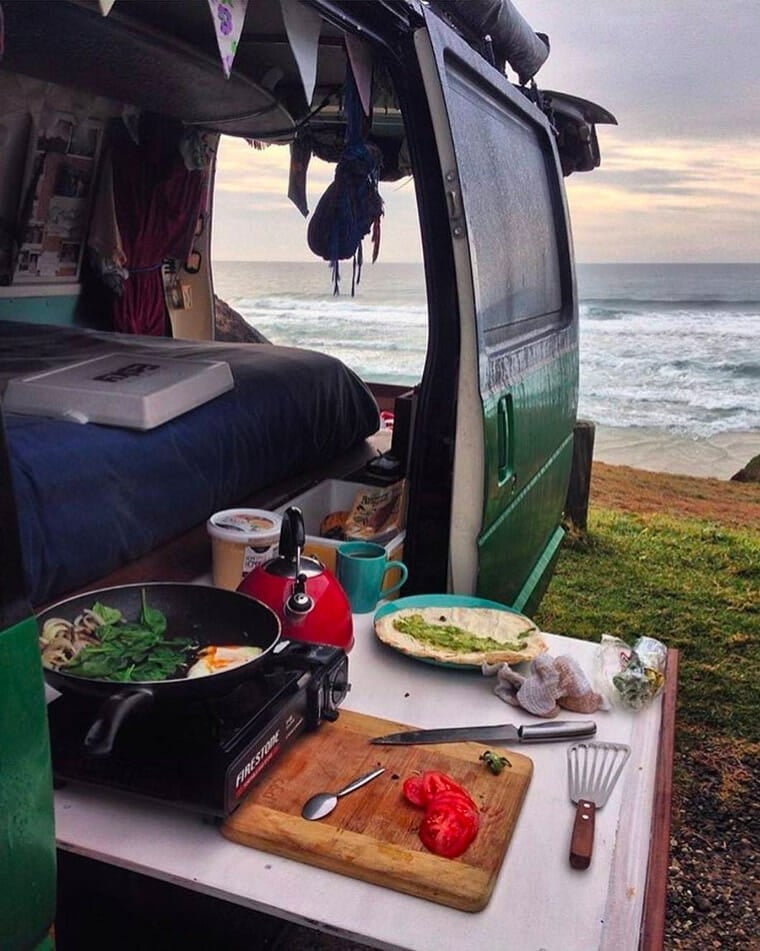 cooking in a van by the beach