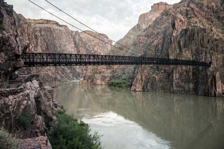 suspension bridge across the colorado river on the Bright Angel hiking trail