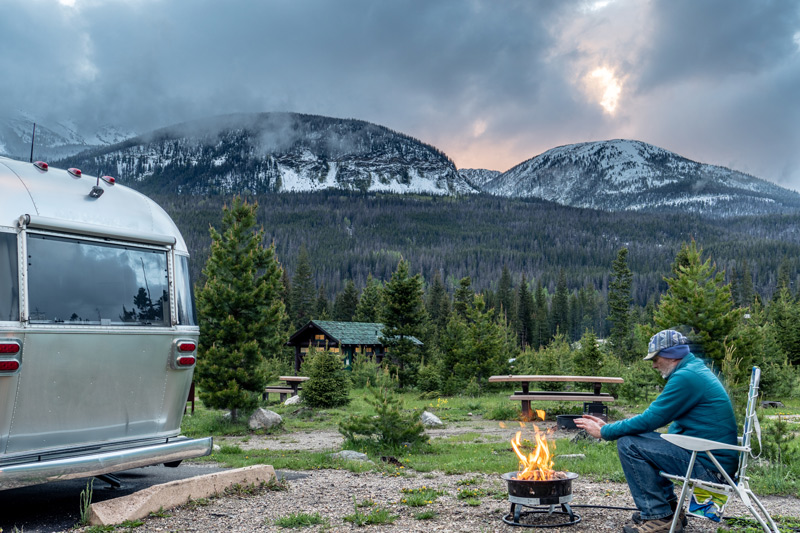 man camping in a trailer at timber creek campground in rocky mountain national park