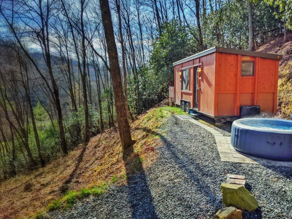 tiny home rental for glamping in the treetops nearby asheville north carolina