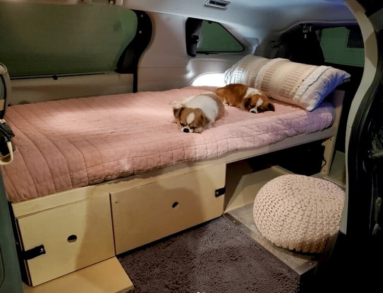 camper van bed and storage inside a toyota sienna LE