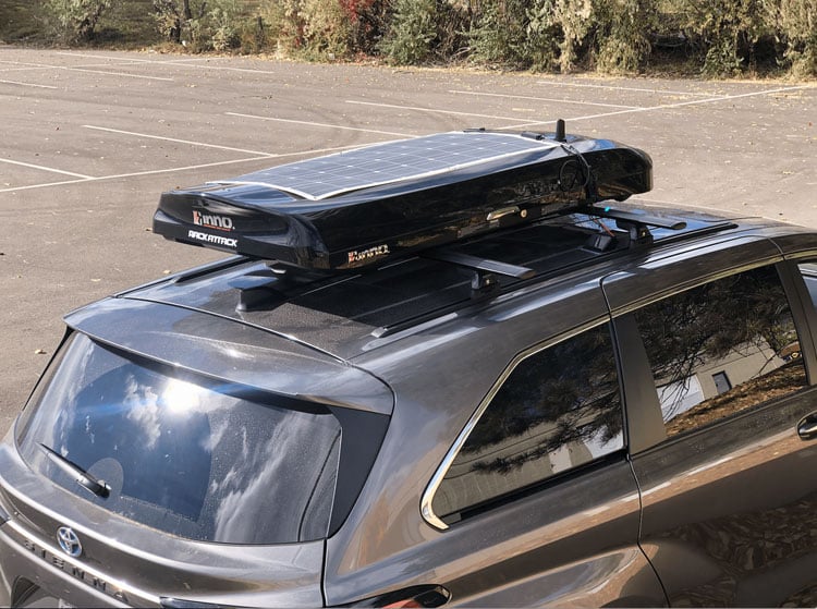 flexible solar panel mounted on top of a toyota sienna camper conversion