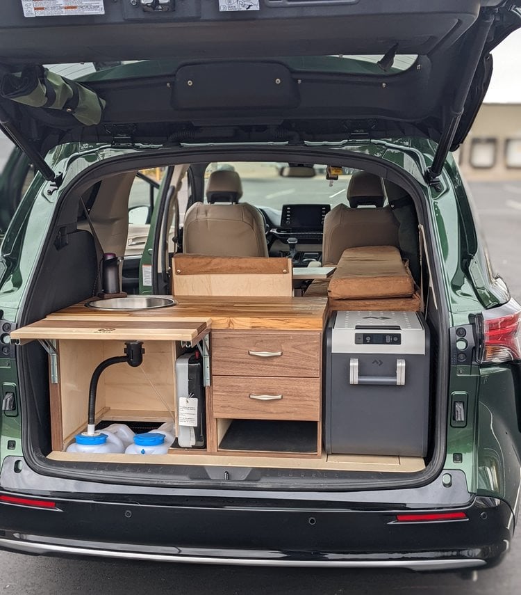 camper van conversion built out of a toyota sienna xle 2021